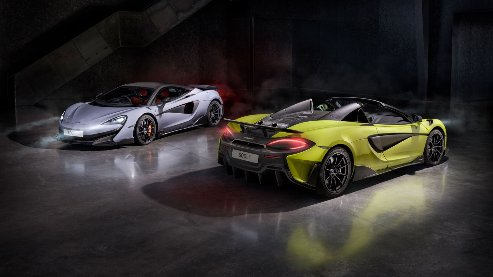 McLaren 600LT Coupe and Spider in an atmospheric setting, showcasing aerodynamics, lightweight design, and top-exit exhausts