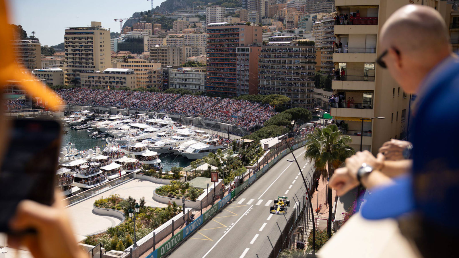 McLaren guest overlooking Monaco Road track from the private terrace.