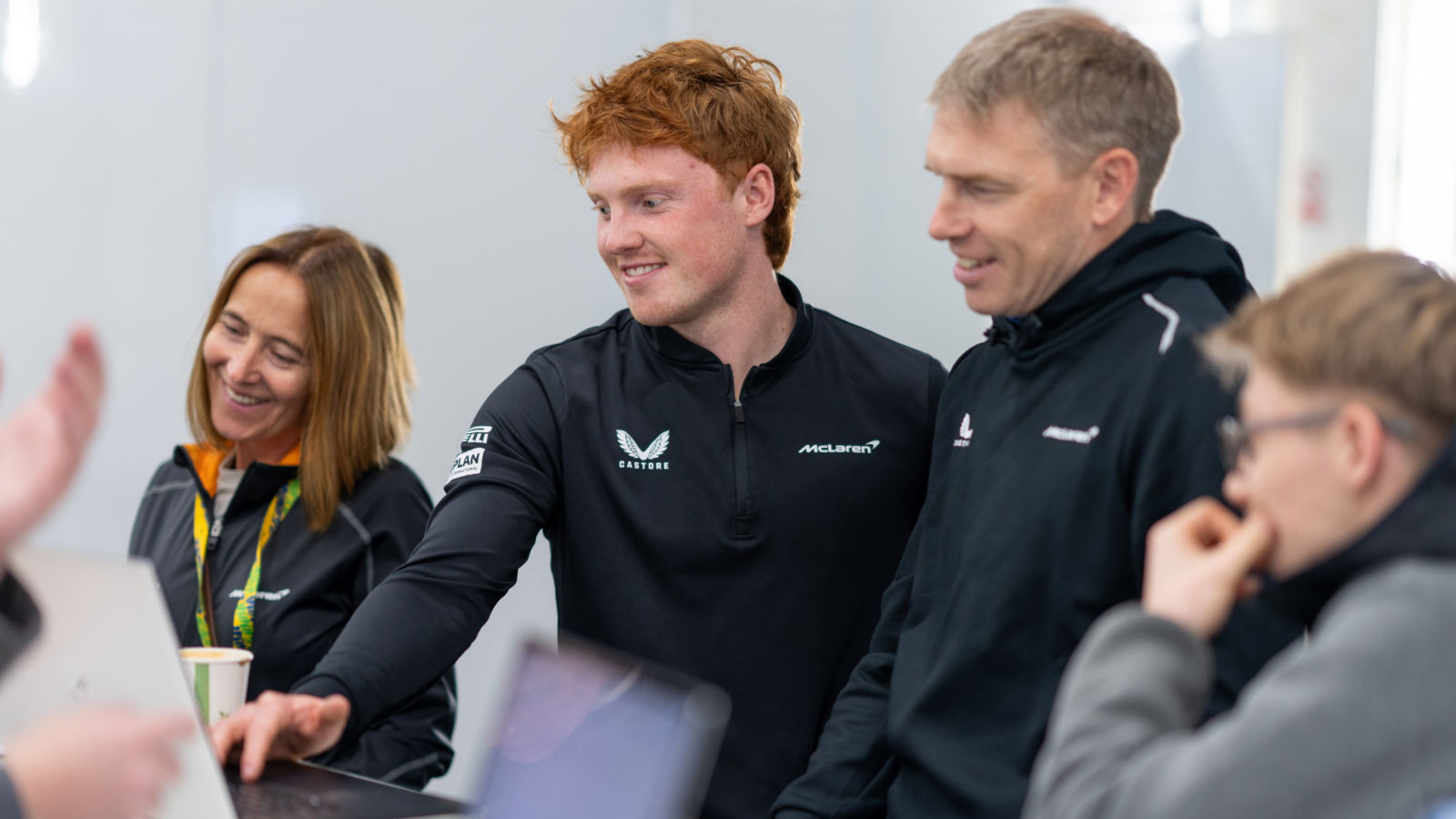 The McLaren team working in office space.