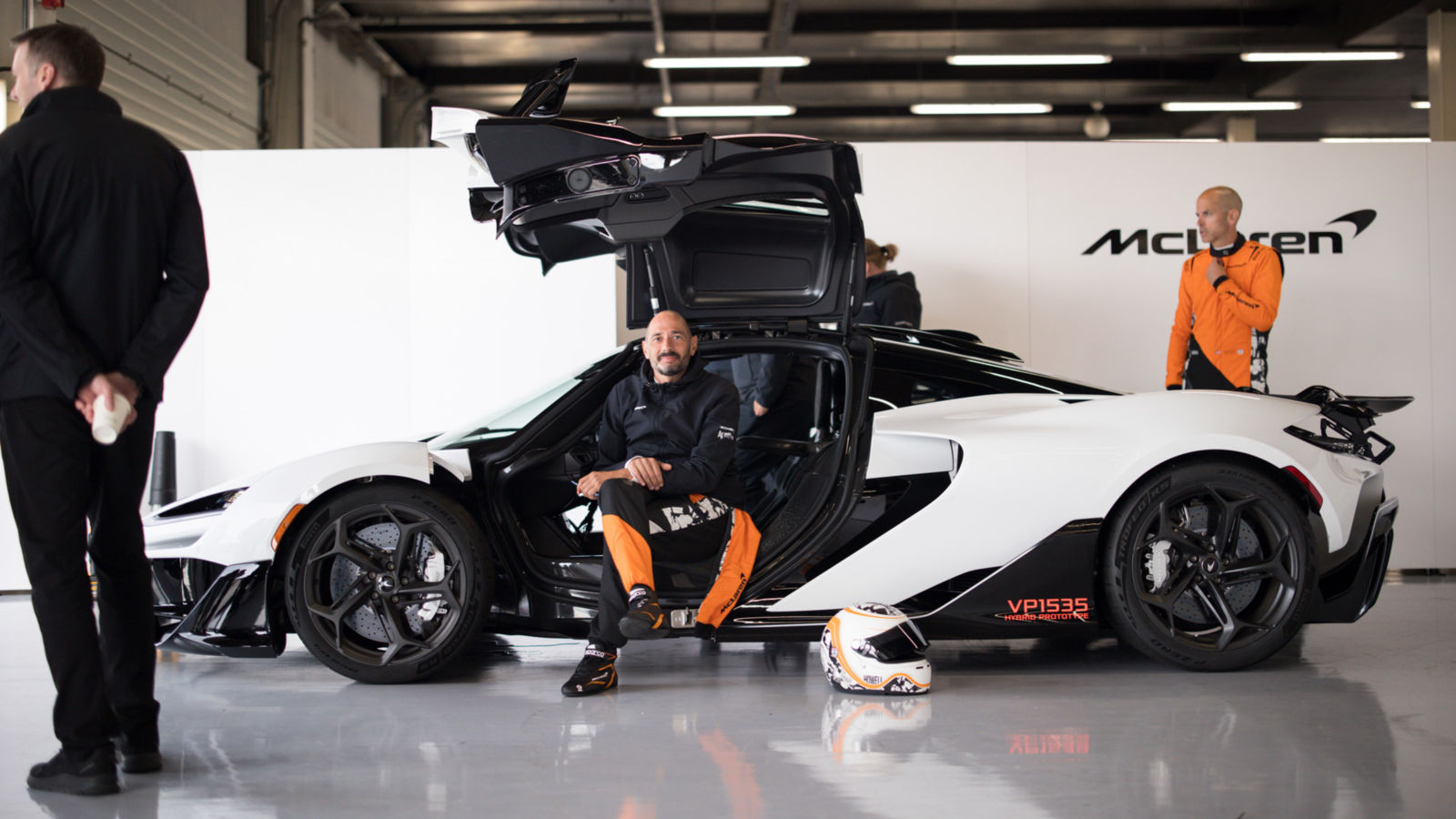 McLaren Supercars aligned on the Silverstone track.