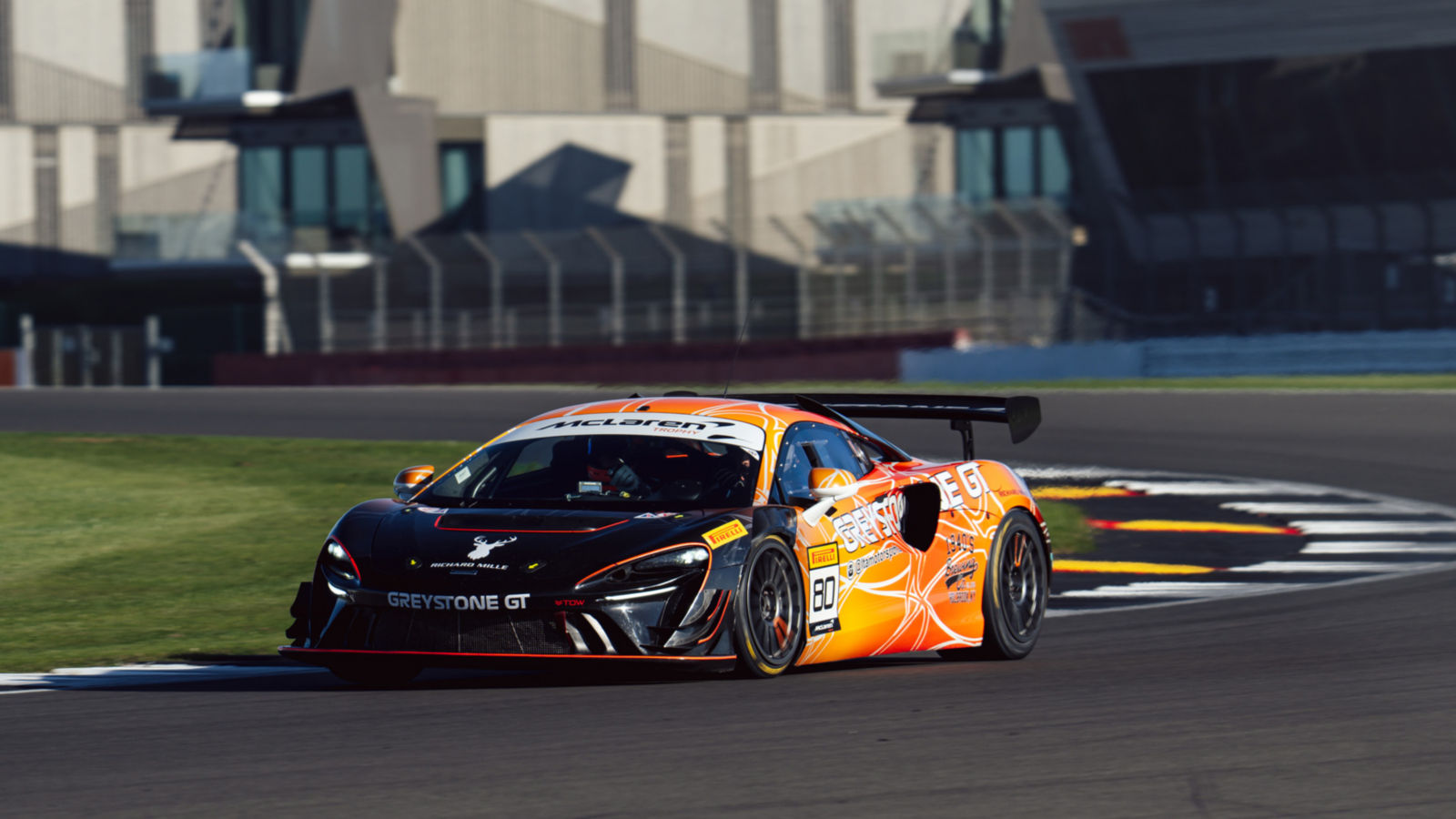 The McLaren team working in office space.