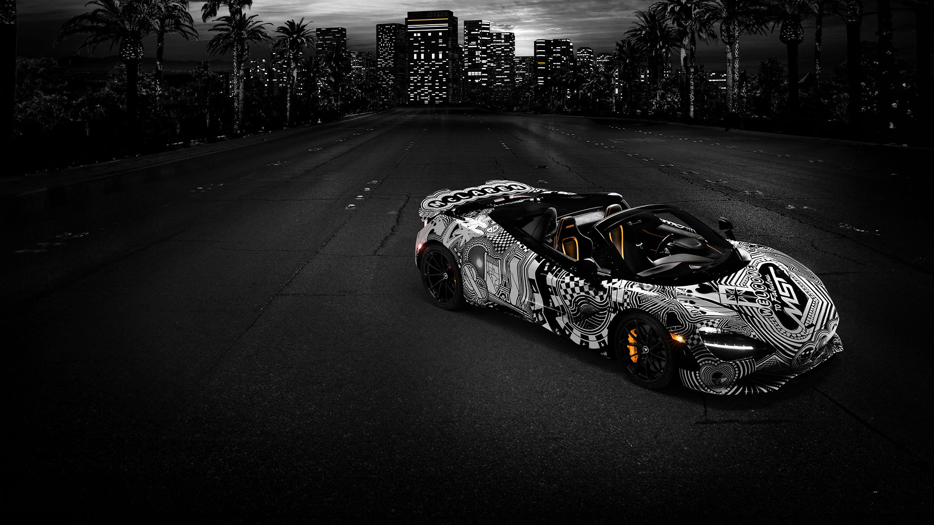 Full view of the McLaren 750S Spider 'Project Viva' by MSO, featuring a hand-painted monochrome livery inspired by Las Vegas and set against a dark city skyline, showcasing a one-of-one bespoke supercar.